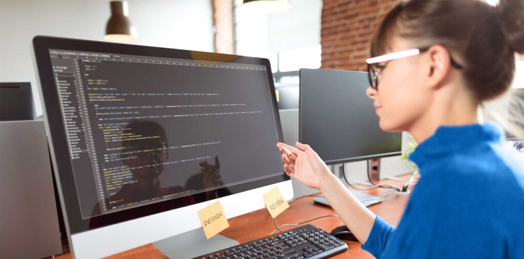 Woman coding in a digital workspace